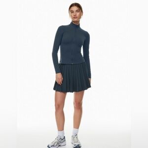 Aritzia TnAction TnaMOVE™ Tennis Mini Skirt in Total Eclipse